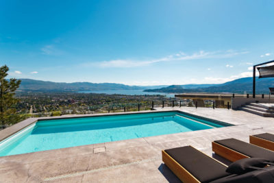 Swimming pool with a view overlooking Downtown from Kelowna's Highpointe luxury neighbourhood