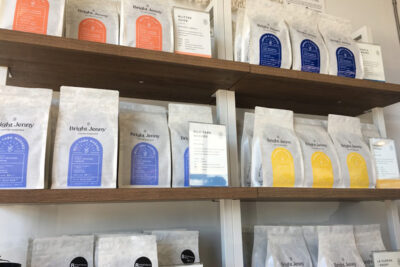 Freshly brewed bags of Bright Jenny Coffee on display
