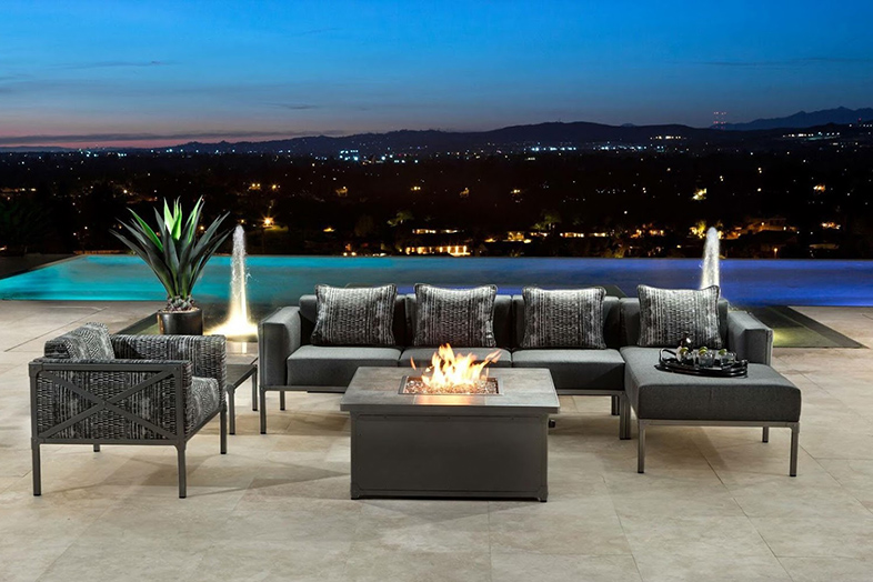 Wicker Land Patio Furniture fire pit and outdoor sofas.